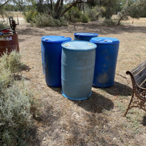 Blue plastic barrels x 4