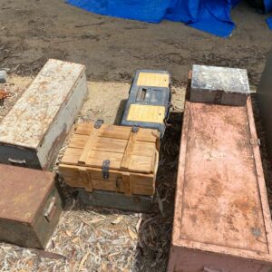 Assortment of metal camp toolboxes